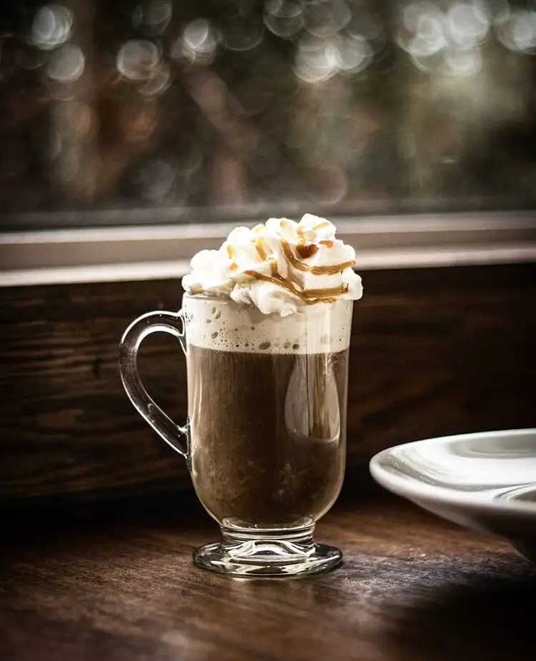 Cappuccino with whipped cream. 