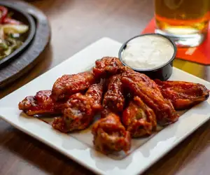 TUESDAY WING DAY! 1 LB OF WINGS FOR SEVEN BUCKS!! AND 6.50 STELLA DRAUGHT